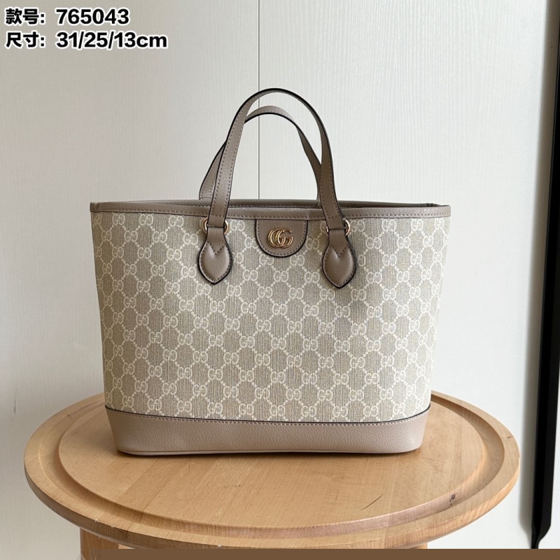 G*u*i shopping bags